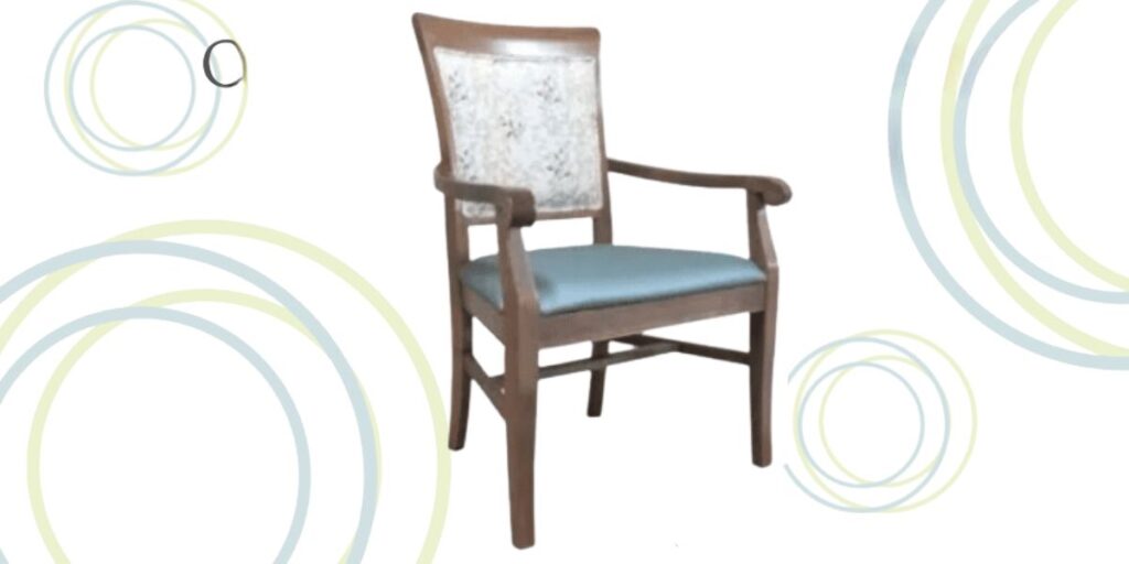 A wooden chair with blue padded seat and armrests, designed for higher weight capacities and patient comfort in healthcare environments.